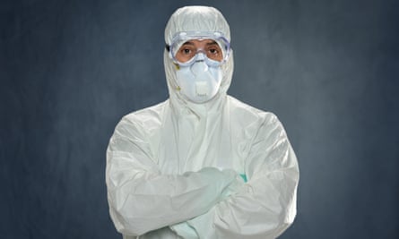 A hazmat suit looming over you is not something you ever want to see, but it is better than a lonely room, with no medical intervention. Photograph: Alamy