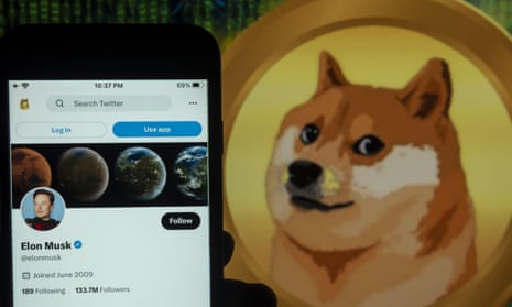 In this photo illustration, the Elon Musk's twitter account seen displayed on a mobile phone screen with a Dogecoin logo in the background