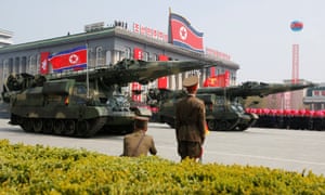 Missiles are driven through Kim Il-sung square on Saturday.