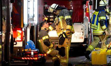Emergency services work in a cordoned-off area near the Christmas market in Magdeburg