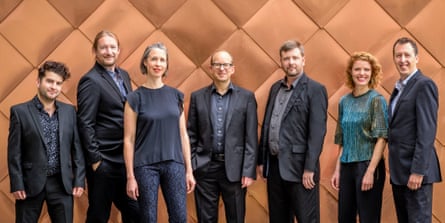 Members of Exaudi stand in a line