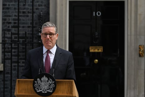 Britain's Prime Minister Keir Starmer speaks to the media outside 10 Downing Street to announce his resignation in London. He looks sad and has a downturned mouth