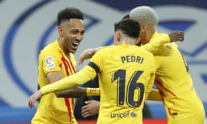 Barcelona’s Pierre-Emerick Aubameyang celebrates with teammates after scoring.