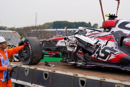 Oliver Bearman’s Haas on a tow truck after the crash in Suzuka.