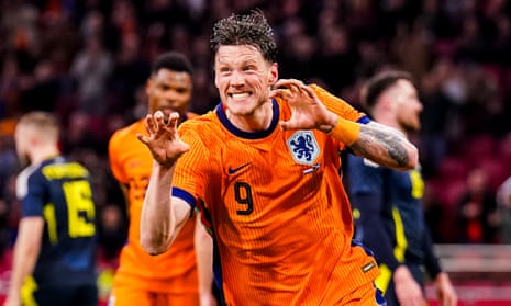 Wout Weghorst celebrates after scoring the hosts’ third goal in Amsterdam.