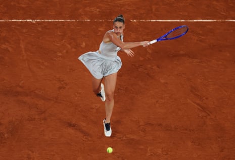 Marta Kostyuk of Ukraine plays a forehand.