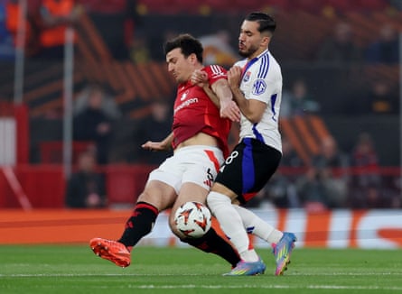 Rayan Cherki up against Manchester United's Harry Maguire in Lyon’s Europa League quarter-final second leg