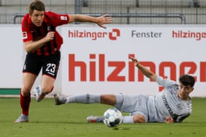 Bayer Leverkusen’s Kai Havertz (right) comes out second best in this challenge with Freiburg’s Dominique Heintz