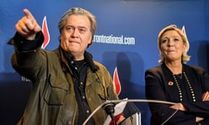 Steve Bannon speaks at a Front National gathering in Lille with its president Marine Le Pen at his side.