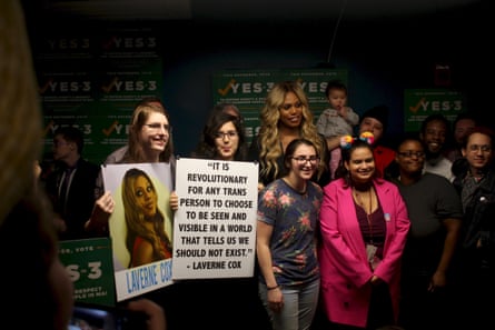 Actor Laverne Cox poses with supporters of a 2016 Massachusetts law that protects transgender people from discrimination.