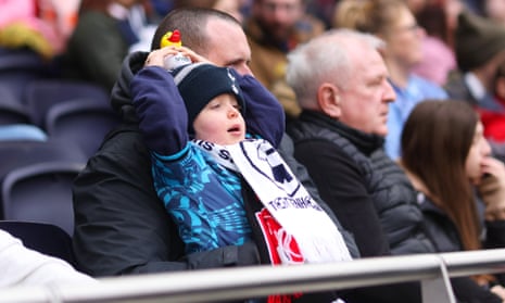 A young Tottenham Hotspur fan enjoys the atmosphere during the FA Women's Super League match between Tottenham Hotspur and Manchester United