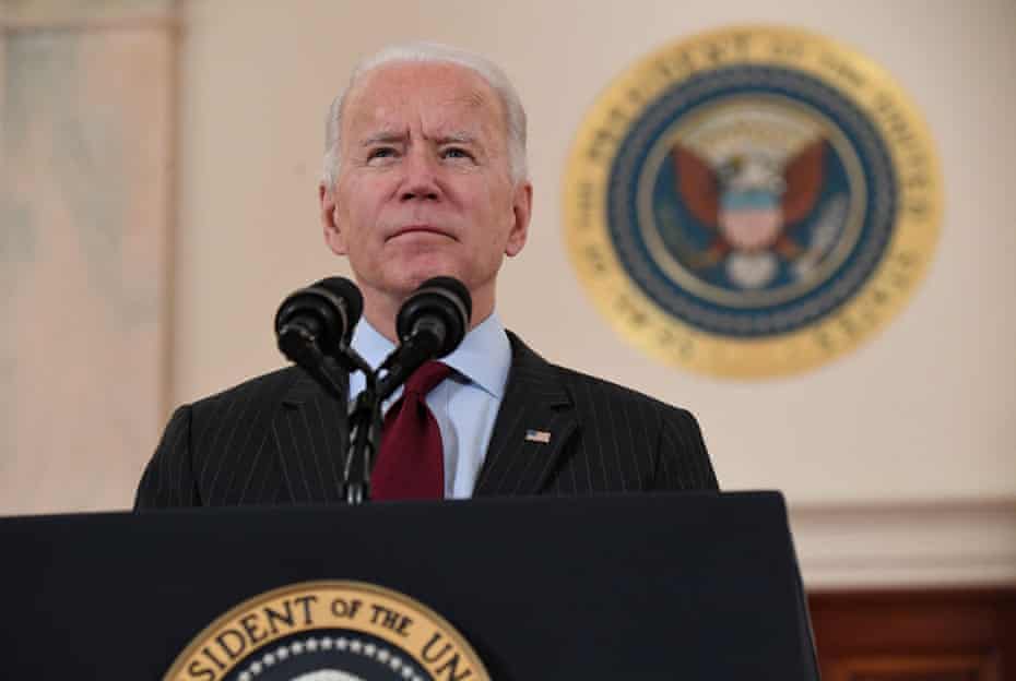 Joe Biden speaks at the Cross Hall of the White House in February about lives lost to Covid after the death toll passed 500,000. 