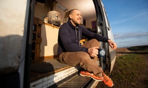 Michael Hayne in the van he has converted into a home.
