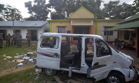 A vehicle damaged when an angry mob lynched one person and injured others in Mohanpur.