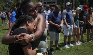 Mourners gather at a vigil following a mass shooting in Dayton, Ohio.