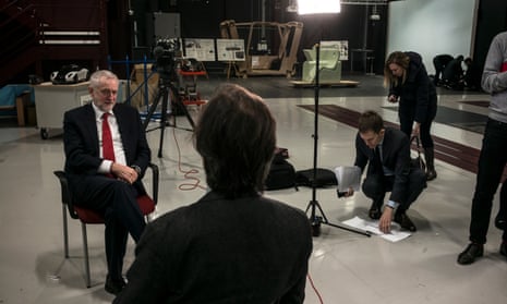 Jeremy Corbyn giving an interview to ITV’s Robert Peston at the National Transport Design Centre in Coventry, where Corbyn gave his speech. Seumas Milne, Corbyn’s strategy and communications chief, listens in, consulting his notes on the floor.
