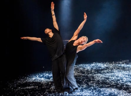 Attention to form … James Pett, left, and Travis Clausen-Knight perform In the Absence. The dancers mirror each others' poses with arms raised high