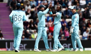 Jofra Archer of England is congratulated by his teammates after taking the wicket of Carlos Brathwaite of West Indies.