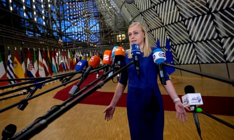 Finland’s foreign minister Elina Valtonen speaks with the media as he arrives for a meeting of EU foreign ministers at the European Council building in Brussels.