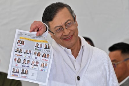 President Gustavo Petro prepares to cast his vote at a polling station in Bogotá.