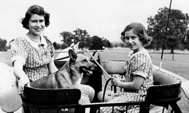 Princess Elizabeth and Princess Margaret in the grounds of Windsor Castle, their wartime residence, 1940.