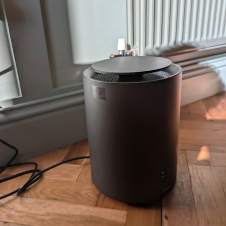 A Duux Threesixty 2 ceramic heater on a wooden floor