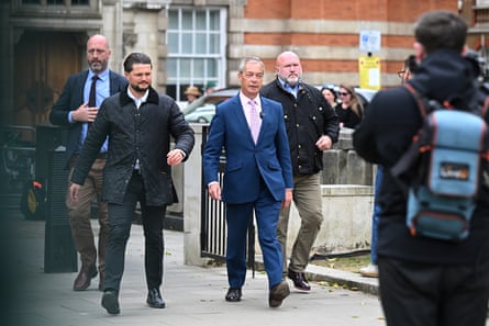 Farage flanked by security