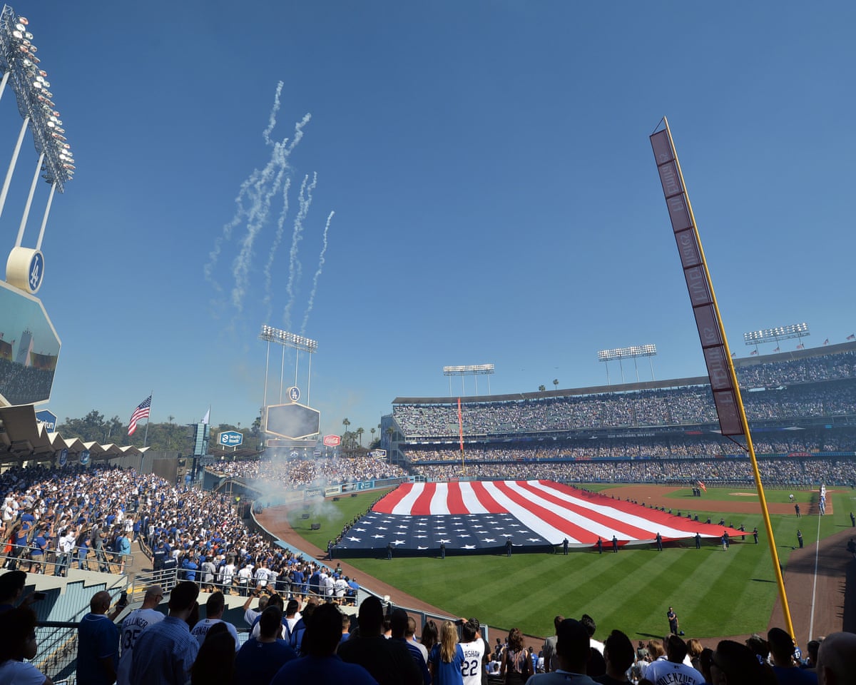 Nezza sings national anthem in Spanish at Dodgers as protest against  immigration raids | Los Angeles Dodgers | The Guardian