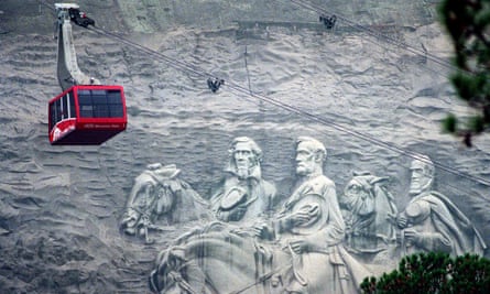 A cable car passes the carvings of Confederate civil war generals as it returns visitors from the top of Stone Mountain in Georgia.