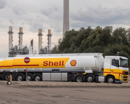 Petrol tankers parked outside a Shell refinery