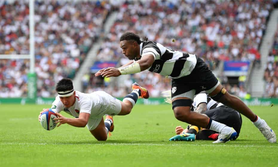 Marcus Smith dives over to score of England’s third try