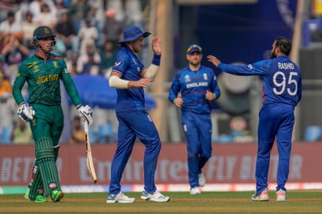 Rashid celebrates with teammates after the dismissal of van der Dussen.
