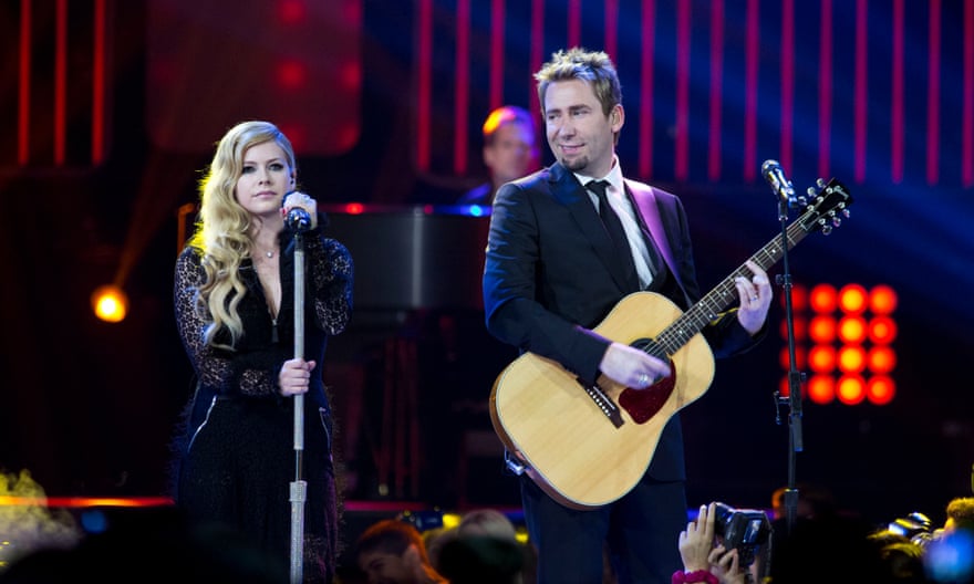 Performing with her ex-husband Chad Kroeger in 2013.