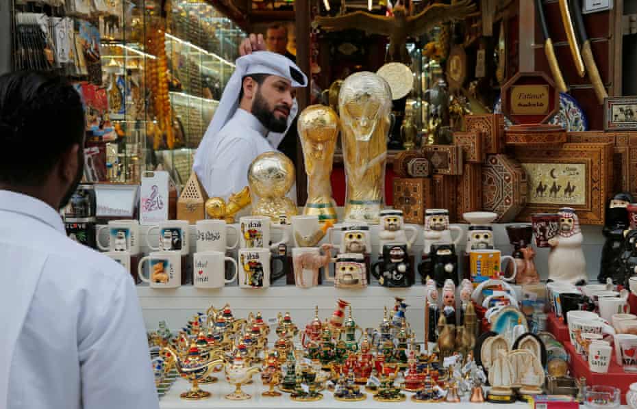 A merchandise stall with replica World Cups in the Souq Waqif market.