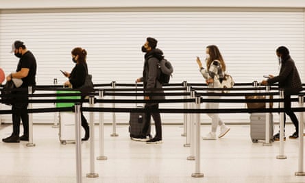 Passengers queuing at Logan airport in Boston.