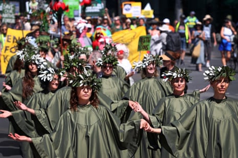 Activists take part in March In March For Forests protests in Sydney