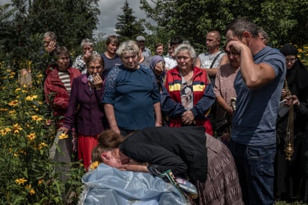 The Rosokhas family mourn the death of Nina Rosokha who was killed by a Russian artillery strike on Lyman