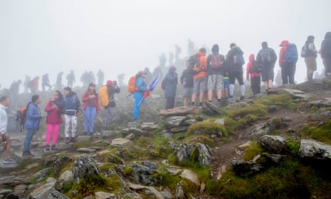 People queuing to reach the summit of Snowdon last week.