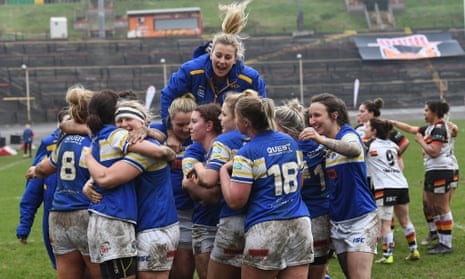 Leeds Rhinos celebrate after their derby win over Bradford, watched by 3,000 fans at Odsal.