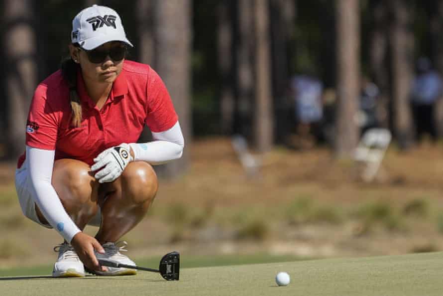 Mina Harigae looks over a putt on the 10th green.