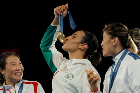 Imane Khelif of Algeria kisses her gold medal during the presentation ceremony after the final of the women’s 66kg boxing at Roland Garros