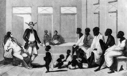 Brazilian slave traders inspect a group of Africans shipped into the country for sale.