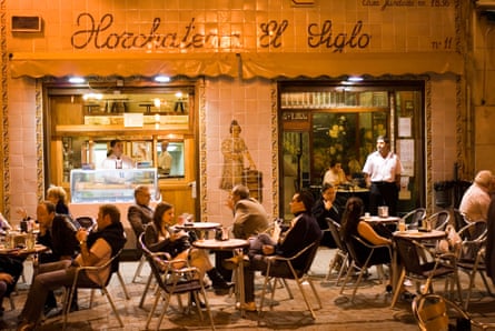 People sitting outside Horchateria El Siglo tiger nut milk cafe on Plaza Santa Catalina in El Carmen centre of Valencia