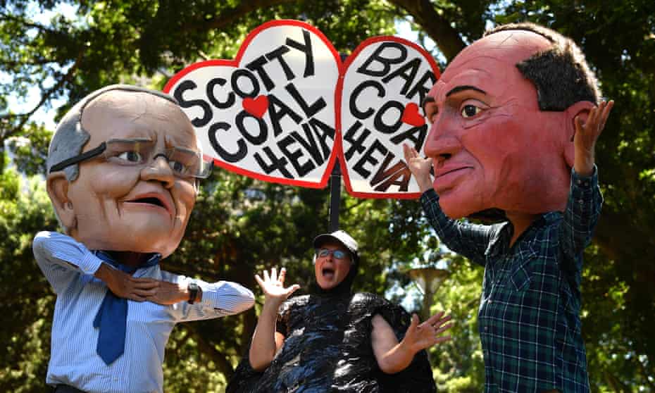 Protesters dressed as Australia prime minister Scott Morrison and deputy prime minister Barnaby Joyce are seen during a rally in Sydney while the Cop26 summit takes place in Glasgow.