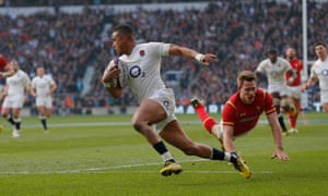 England’s Anthony Watson beats the dive of Wales’s Liam Williams to score his team’s first try during the Six Nations international rugby union match at Twickenham in London.You can see more of Tom’s photos from the match here