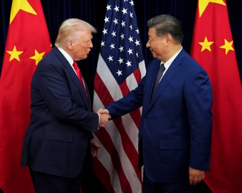 President Donald Trump greets Chinese President Xi Jinping ahead of a bilateral meeting at Gimhae Air Base on October 30, 2025 in Busan, South Korea. qhiukiqrihtinv