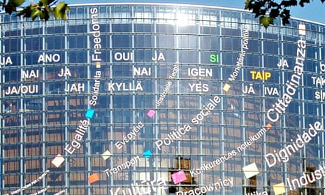 The European parliament building sporting some of the languages spoken by EU member states.