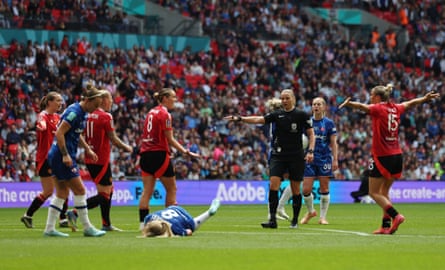 The referee, Stacey Fullicks, awards a penalty to Chelsea after Celin Bizet fouled Erin Cuthbert.