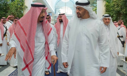 Saudi King Salman, left, talks to Sheikh Mohammed bin Zayed al Nahyan of the UAE.