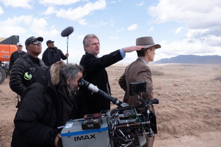 Christopher Nolan, center, and Cillian Murphy, right, during the making of Oppenheimer.